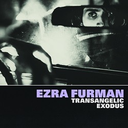 Albumcover von EZRA FURMAN – Suck The Blood From My Wound; monochromes Foto, scharfgestellt auf den Rückspiegel eines Autos, in dem Mann Augen und Nase eines Mannes sieht; unten in Lila und weiß Titel/Artist