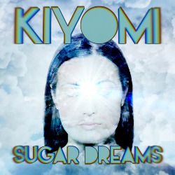 kiyomi - sugar dreams; Foto vom Gesicht einer Frau; man kann wenig erkennen, weil darüber ein Bild vom Himmel gelegt wurde und die Sonne direkt aus ihrer Stirn strahlt