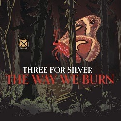 Albumcover von THREE FOR SILVER – Down In The Cut; gemaltes Bild von einem dunklen Wald, durch den eine überdimensionale große rote Motte mit braunen Flügeln auf eine vergleichsweise kleine Laterne zufliegt; in der Mitte Artist/Titel in weiß und rot