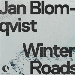 Albumcover von JAN BLOMQVIST - Winter Roads, schwarze Schrift auf einem Foto von verschneiten Bergen