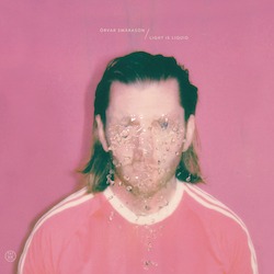 ÖRVAR SMÁRASON - Photoelectric; Porträt des Künstlers, das Gesicht ist leicht verpixelt, pinker Sweater und pinker Hintergrund